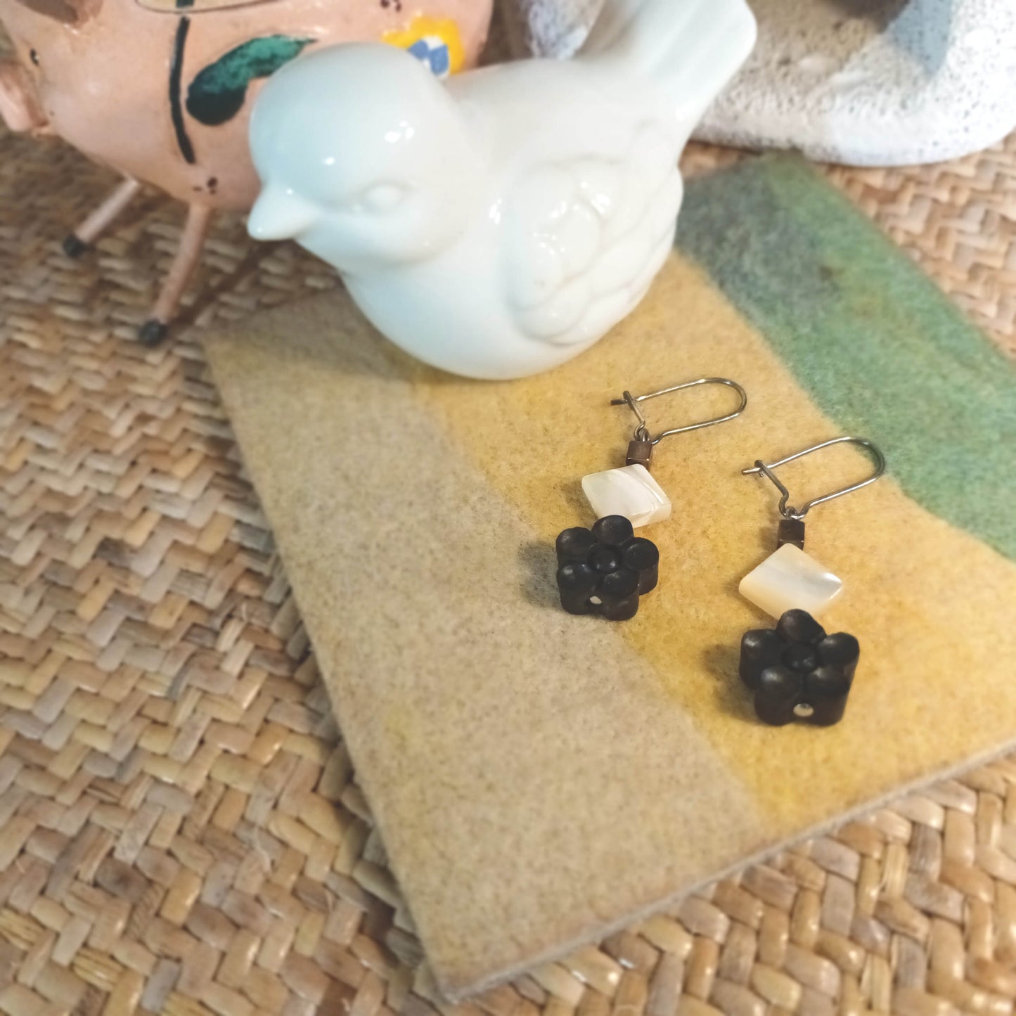 Scented black sandal wood blossom flower and shell ear pins