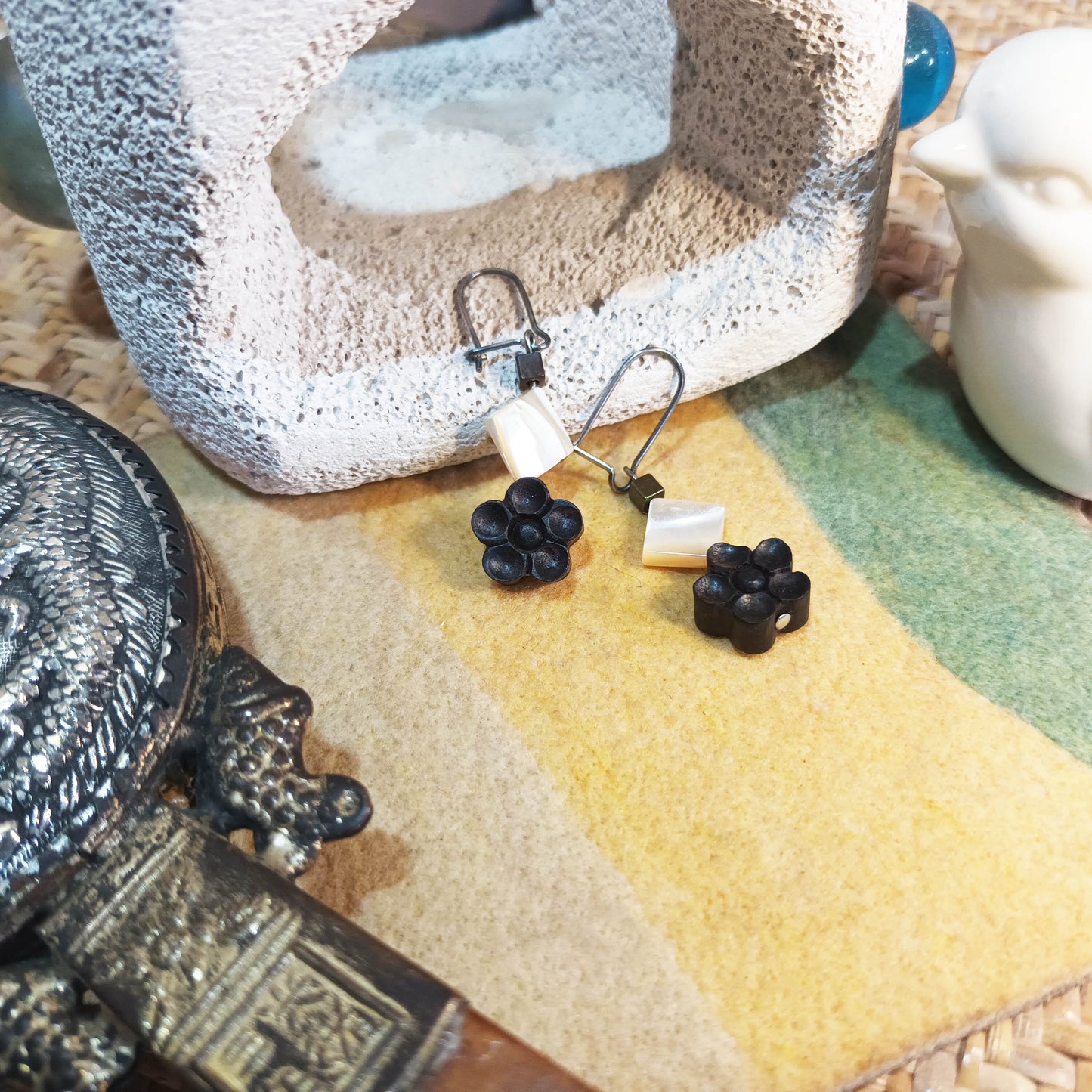 Scented black sandal wood blossom flower and shell ear pins
