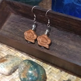 Pair of sterling silver ear wire drop earrings features peach wood crafted chinese lucky cloud decorated by glass bead, is fragrance diffuser
