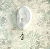 925 silver Star-of-David platinum plated ear wire drop earrings decorated by wood and glass beads display on a ear model