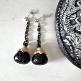 Pair of 925 silver earrings in motif of black sandal wood crafted clinking chinese dingle bell in lovely eggplant form is an aroma diffuser