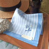 Unisex cotton hanky with blue border and white stripe, hand stitched a small Chinese style line art motif at the corner
