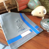 Noble blue and silver grey cotton handkerchief has a hand embroidery of moon night at the corner