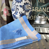 Noble sky blue cotton handkerchief with double silver grey stripes border, hand stitched  a flying plane in the sky of old temples in wood