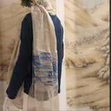 Sheer and versatile olive color silk wool scarf, embroidered a big blue line art landscape pattern of an ancient Chinese village, along the organza hem.