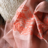 Sheer and soft pink color silk wool scarf has a big line art embroidery of landscape scenery includes old chinese cottage, low bush, livestock and rivers.