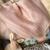 Sheer soft coral pink color silk wool scarf carries a shade of shimmer, hand embroidered a big line art of  magnolia flower. 