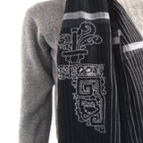 close-up of black light weight long scarf with white fine stripes and light grey border hand stitched ancient chinese decorative pattern