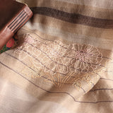 light camel color silk wool scarf decorated by shimmering texture ground, brown stripes in varies width, and a refined hand embroidery of multi-color chrysanthemum pattern.