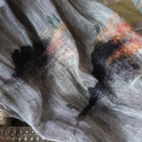 Close up of a grey pure linen scarf  with hand-felted colorful landscape pattern featured by mini hand stitch chinese lodge and pine trees.
