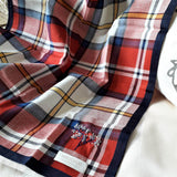 Classic plaid pure cotton handkerchief with black border, has hand embroidered a mini picture of a  blossom tree at the corner.