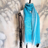Turquoise color pure linen scarf embroidered an line art landscape of spaceman gets lost in a jungle